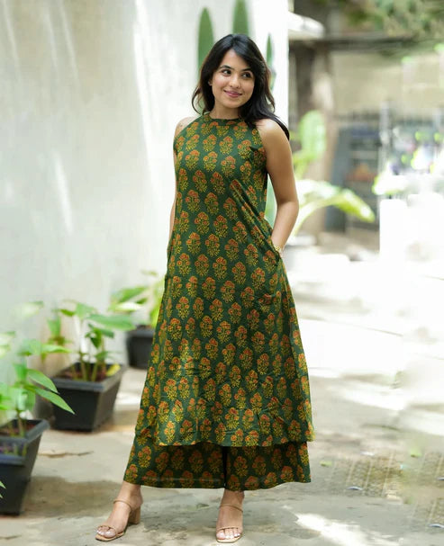 Shreya cotton printed green halter neck A-line kurta pant