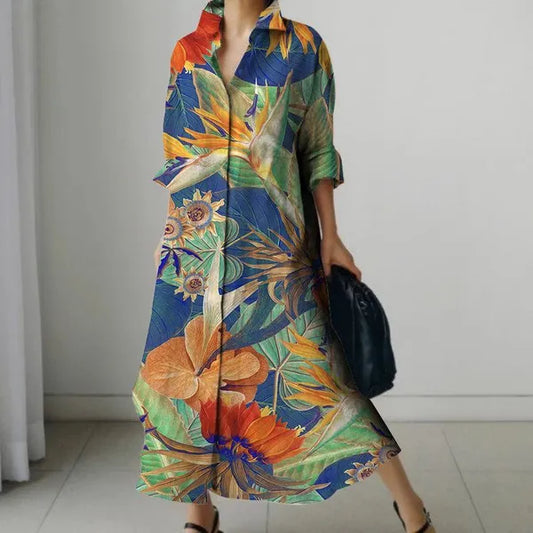 A person wearing a multicolor linen blend long dress with a vintage printed design featuring abstract patterns.